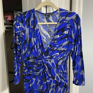 Blue black and grey top with a twisted front